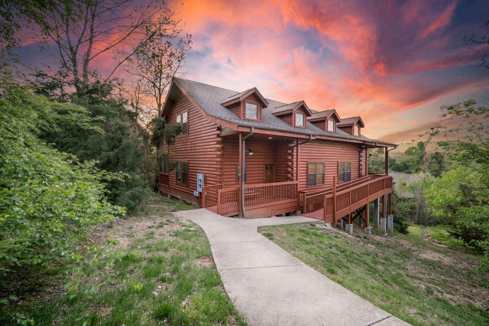 Cabin living room with stone fireplace, cozy setting for planning a milestone birthday weekend in Branson