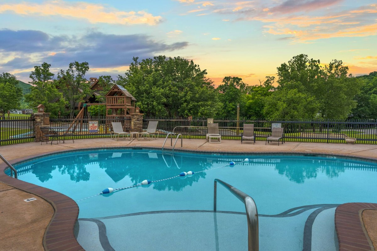 Outdoor pool and playground at Table Rock Landing near Indian Point in Branson, Missouri, at sunset